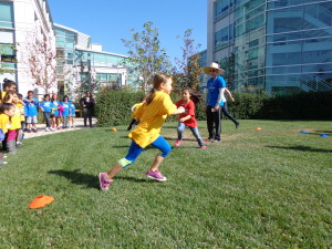 Fifth grader, Naomi Nishikawa, engages in healthy, productive play facilitated by Playworks and Google volunteers on Google's Sunnyvale campus.