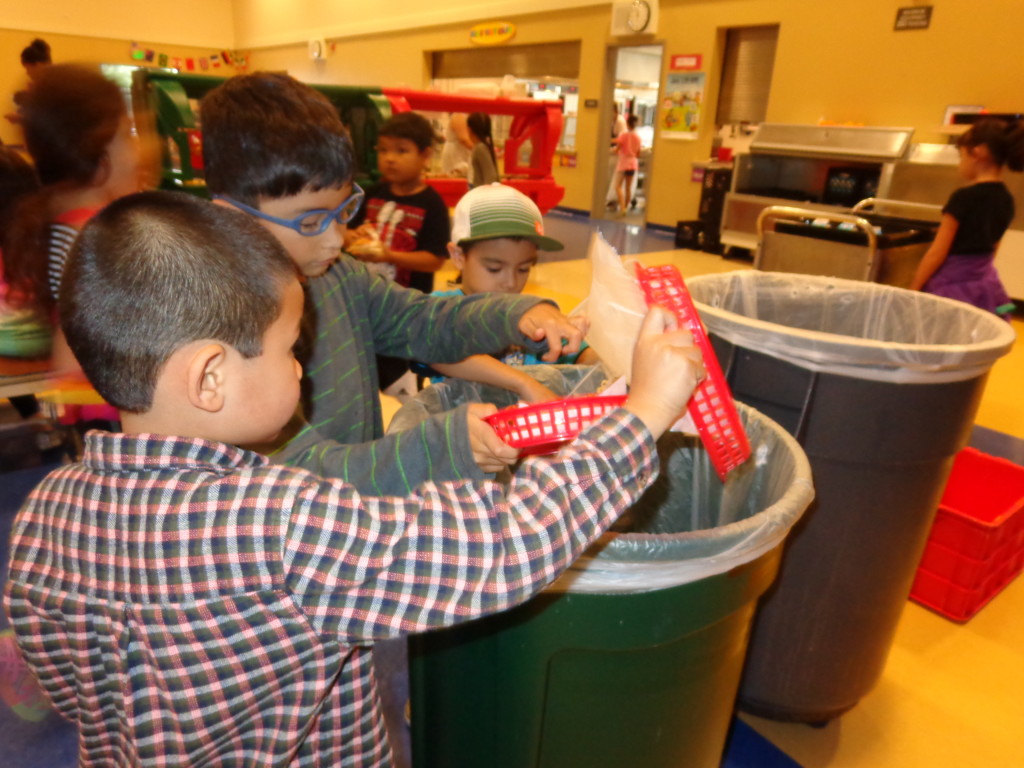Lakewood Lions separate compostable waste from trash and recycling. 