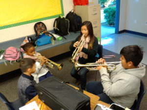 students practice the trumpet