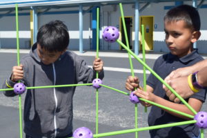 boys building togeter