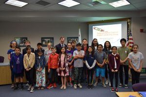 Superintendent with students