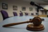 wooden gavel on desk