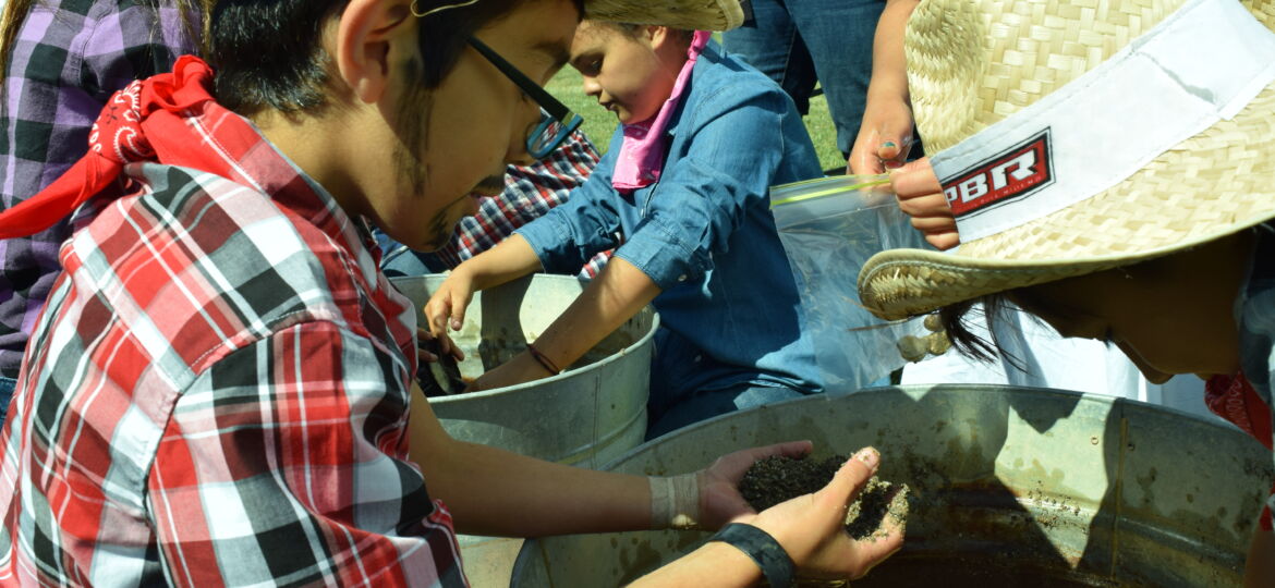 Students pan for gold