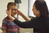 Young boy gets new glasses