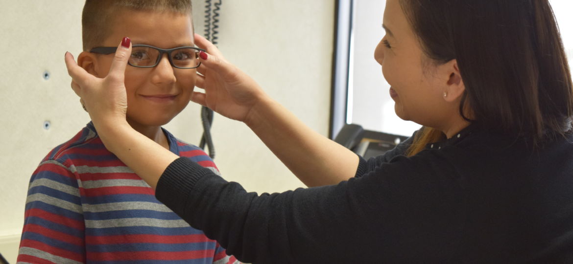 Young boy gets new glasses