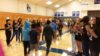 New sixth grade students welcomed by older students