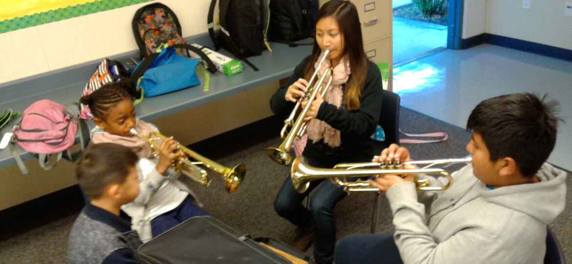 students practice the trumpet