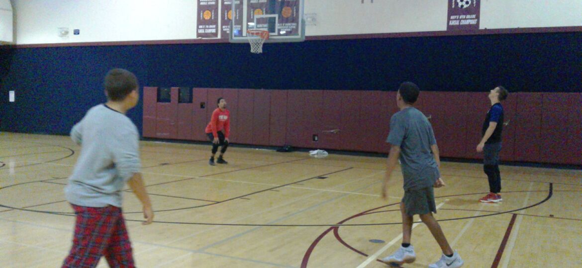 CMS students play basketball with police officers and community services coordinators