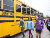 students exit school bus