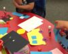 kids working on transportation words