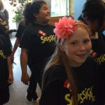 Student performers arrive to sing songs from Seussical